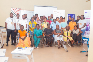 Fidelity Bank and Ghanaian European Centre for Jobs representatives with PWDs from Goaso