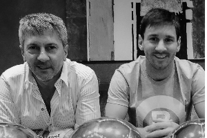 Lionel Messi (R)  with his father Jorge Messi (L)