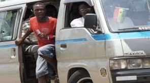 File photo of a bus conductor not wearing a nose mask