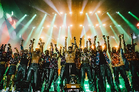 Usher (middle) and dancers at the 2022 Global Citizen Festival in Accra