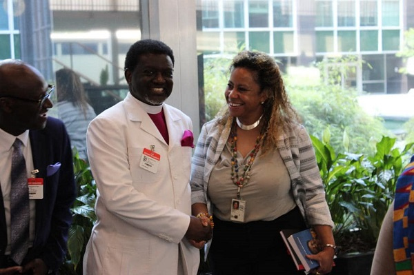 Archbishop Charles Agyinasare with a US govt Official