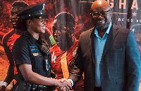 GFA President, Kurt Okraku, in a picture with Liaison Officer Mabel Addai