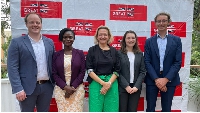 British High Commissioner to Uganda (C) Kate Airey and other officials pose for a picture