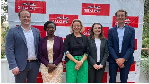British High Commissioner to Uganda (C) Kate Airey and other officials pose for a picture