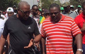 John Dramani Mahama (left) chating with Koku Anyidoho (right)