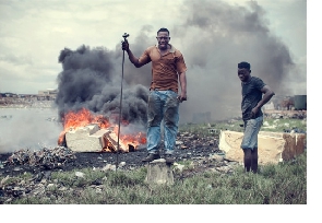 People at a burning site