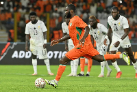 Franck Kessie (in orange jersey) converted a penalty for Côte d’Ivoire to beat Ghana 2-0