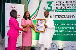 Jennifer Y. Annor-Tettey receiving the honour on behalf of President John Mahama