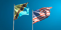 Tanzanian flag (left) and US flag