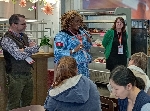 Dr. Adwoa Kwegyiriba, Principal of FRANCO, speaking with some foreign individuals