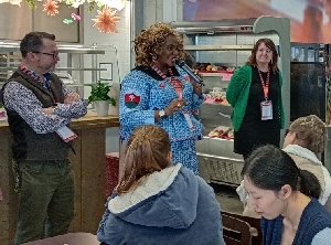 Dr. Adwoa Kwegyiriba, Principal of FRANCO, speaking with some foreign individuals