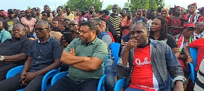 Joseph Yamin with some NDC executives at Toflokpo in the Ada West District