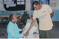 A man casts his vote in the ongoing presidential elections