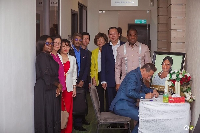 Rev Dominic Yeo signing the book of condolence