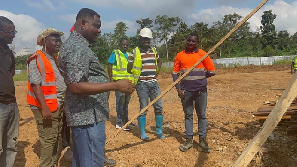 George Dadzie Jnr supervising the process