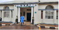 A man walks infront ot the entrance of Uganda Virus Research Institute (UVRI)