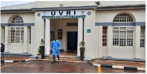 A man walks infront ot the entrance of Uganda Virus Research Institute (UVRI)