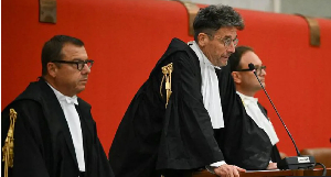 The verdict was read out in a Genoa court by Judge Paolo Lepri (C)