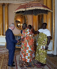 Otumfuo Osei Tutu II (right) shaking hands with King Charles III