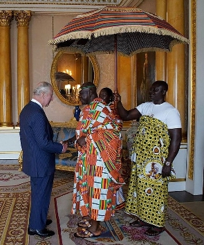 Otumfuo Osei Tutu II (right) shaking hands with King Charles III