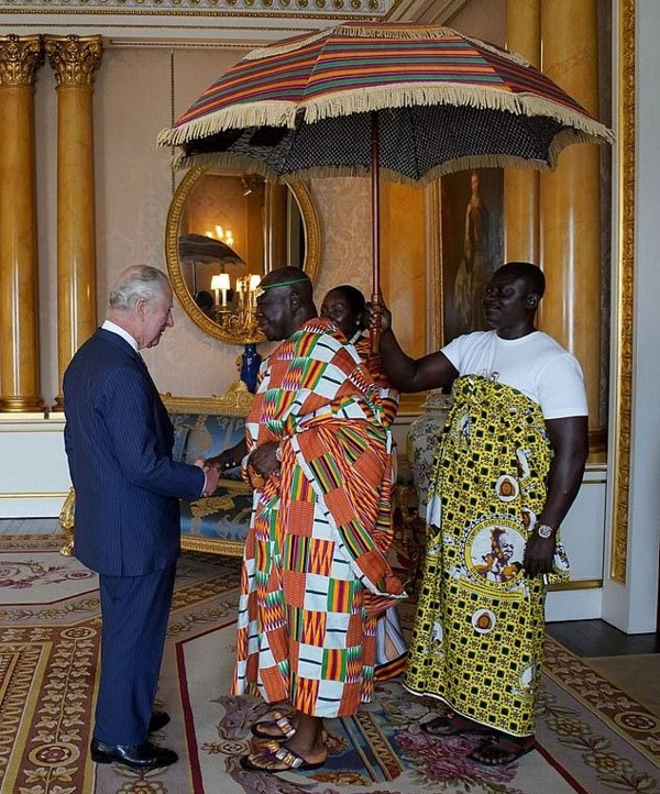 Otumfuo Osei Tutu II (right) shaking hands with King Charles III
