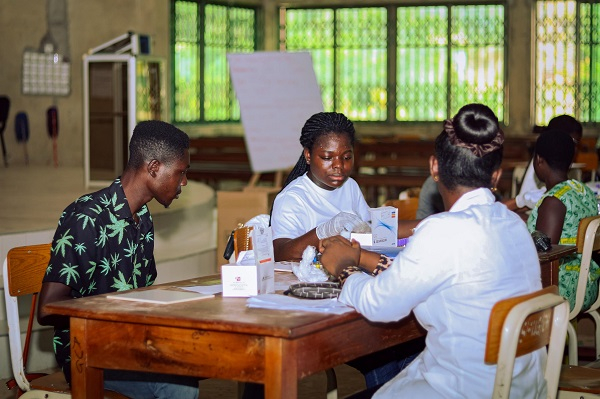 Students joined the queue, eager to be part of the life-saving exercise