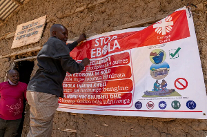 A Man Hangs On Ebola Awareness.png