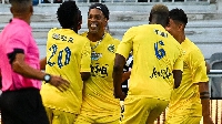 Ronaldinho celebrates after scoring