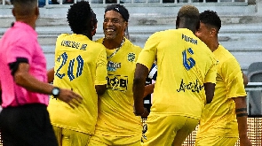 Ronaldinho celebrates after scoring
