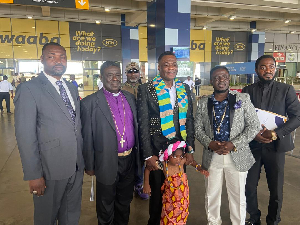 Archbishop Kofi Adonteng Boateng (Middle)