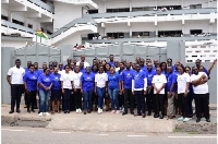 Staff of Sacred Heart Technical Institute and Standard Chartered Bank in a photo