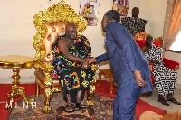 Benito Owusu-Bio in a handshake with the chief