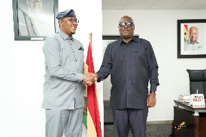 Ghana's High Commissioner to Nigeria, Baba Sadiq Abdulai Abu (L) and GIPC CEO, Simon Madjie
