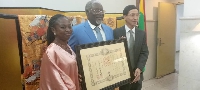 Ambassador of Japan to Ghana Mochizuki Hisanobu honoring Professor Abraham Kwabena Anang