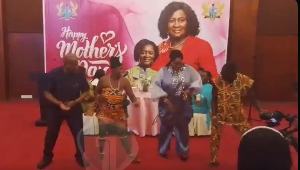 Alex Segbefia and Agnes Naa Momo Lartey dancing at the event