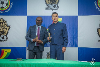 GFA President Kurt Okraku with a representative from X1