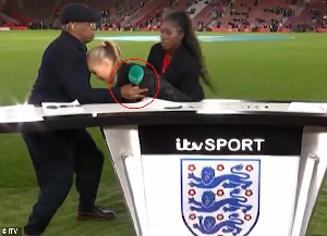Laura Woods (M) collapsed during a build up to the England vs Ghana game