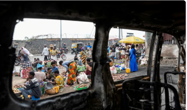 A view shows the remains of a vehicle hit by heavy and light weapons before Goma fell to M23 rebels