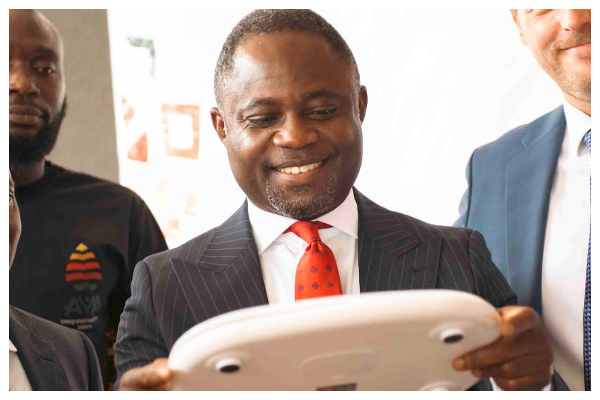 Kwabena Mintah Akandoh inspects donated medical equipment