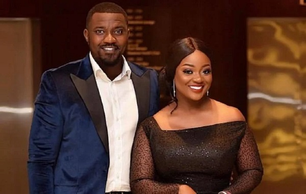 Actor-cum-politician John Dumelo (L) with actress Jackie Appiah (R)