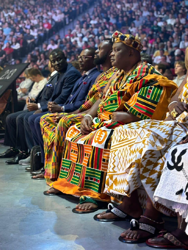 HRM Nii Ayibontey II in yellow Kente from right