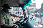 Michael Kpakpo Allotey, Mayor of Accra is seen in on of the trucks