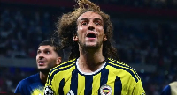 Guendouzi celebrates at the end of the Champions League play-off round second leg against Lyon