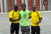 Andy Gyamfi (M) with his coach Desmond Ofei (L)