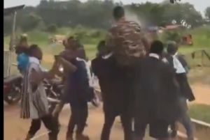 The Officer Is Seen Being Carried By The Kingmakers .png