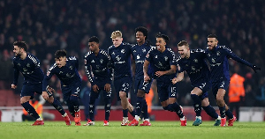 Manchester United players celebrating their victory against Arsenal