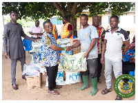 Richard Edem Kofi Kpotosu donated relief items to families affected by recent flooding