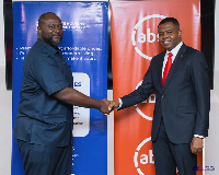 John Bawah (L), Managing Director of State Housing Company Limited (SHC)