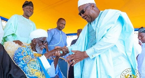 President Mahama (standing) Exchanging Pleaseatories With The Chief Imam