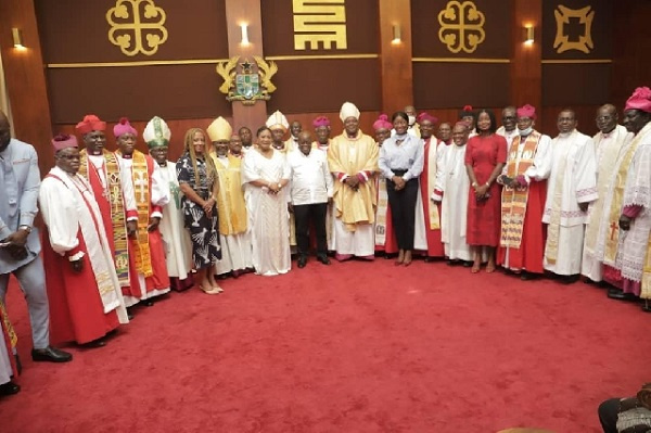 Ghanaian clergy with the president of the Republic of Ghana